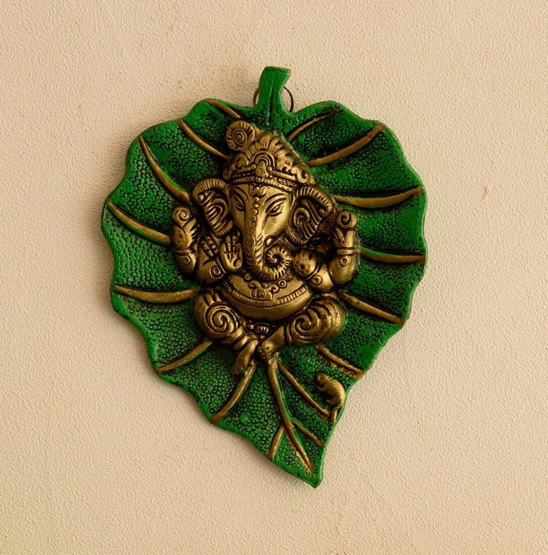 Wall hanging Lord Ganesha on Leaf Yoga Meditation Home decor, Decorative Showpiece-15.24 cm(Aluminium,Silver,Green) house warming Gift India