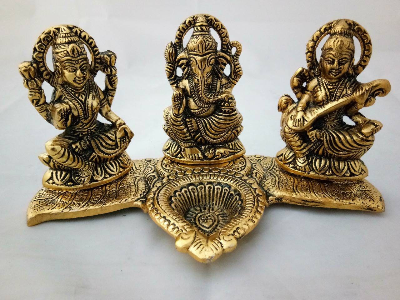 GIFT Laxmi Ganesh Saraswati Idol Showpiece Oil Lamp | Diya | Deepak Showpiece ( 20 cm, Golden